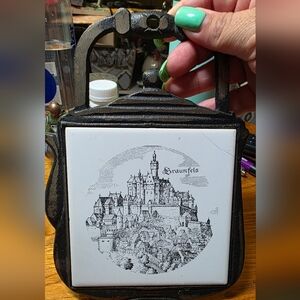 Source Unknown Black Cast Iron Braunfels Germany Trivet with White Ceramic Tile